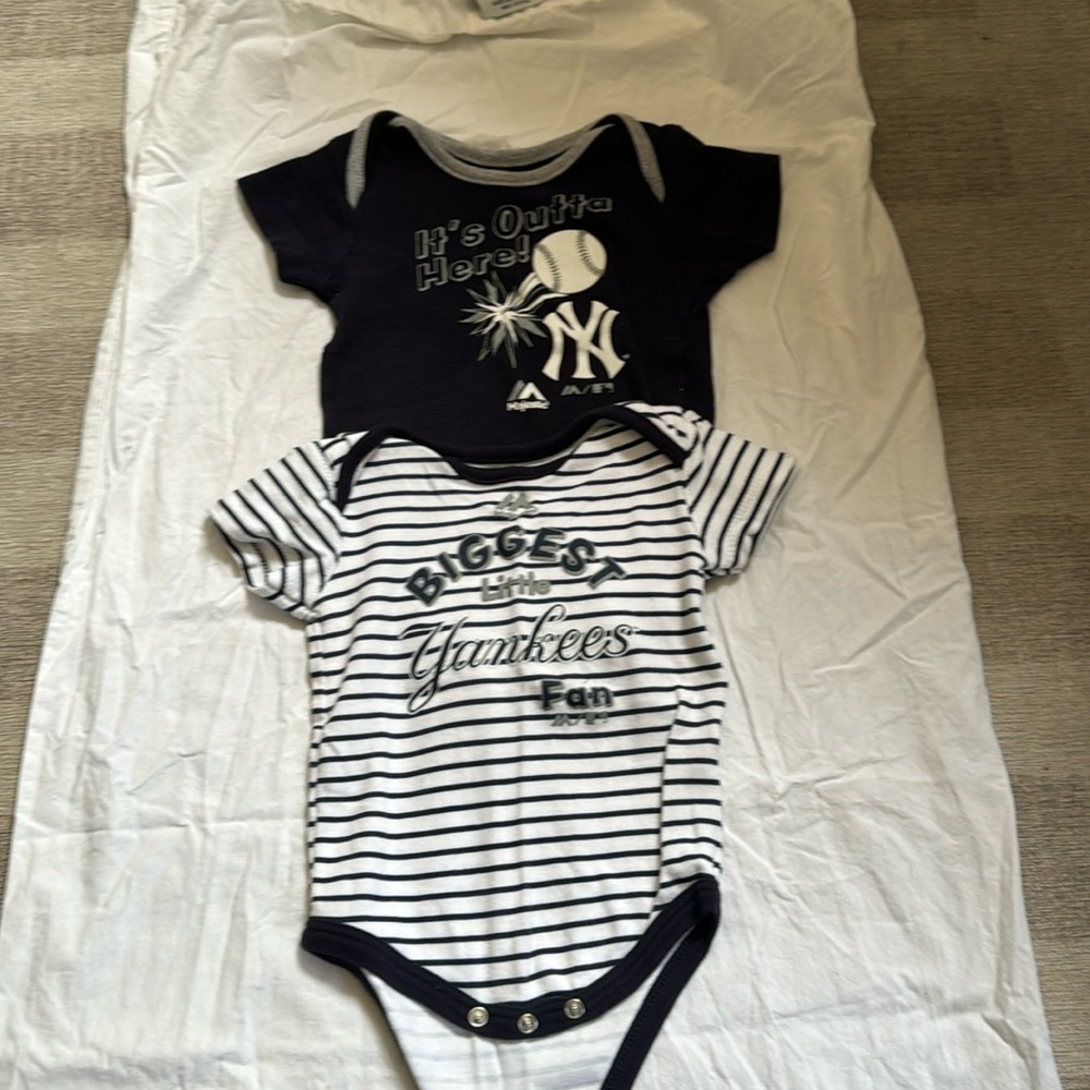 Set of 2 New York Yankee onesies. Only worn once! Size 6-9 months.